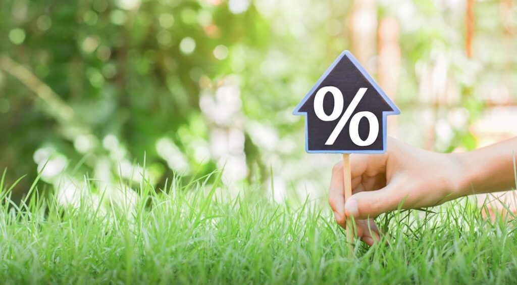 Calcular los impuestos por pagar en la compra de un terreno